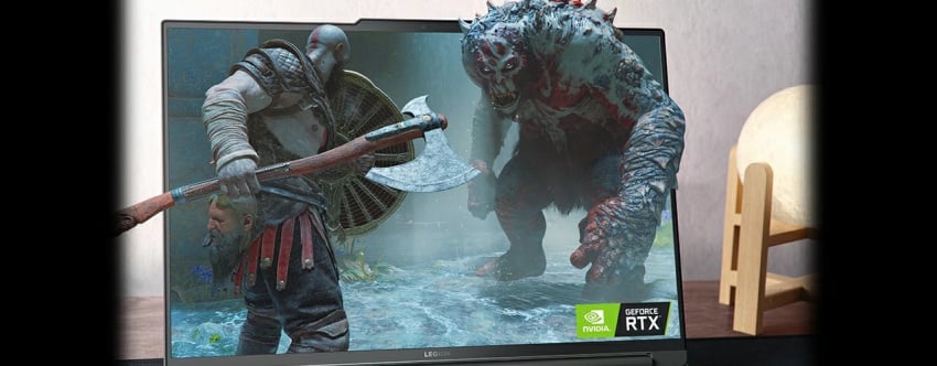 A fighter battles a monster with the Lenovo Legion Slim 7i Gen 8 (16 Intel)’s display in the background and an NVIDIA logo in the foreground