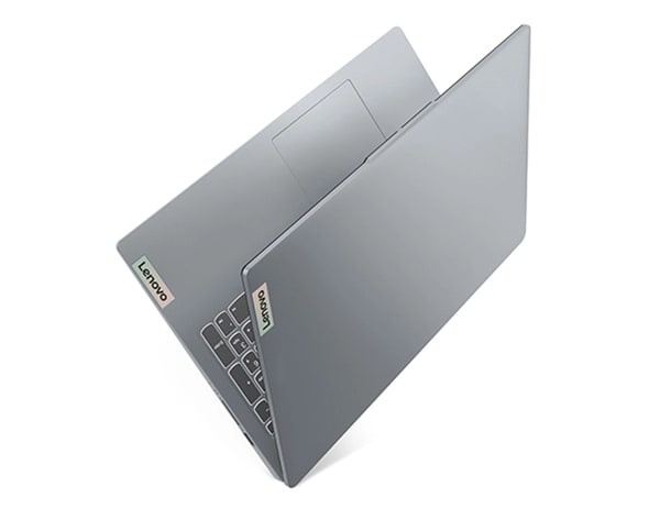 Lenovo IdeaPad Slim 3i Gen 8 laptop in Arctic Grey folded like a book standing on its spine.